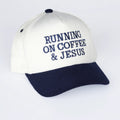 Cap with 'Running on Coffee & Jesus' text on a white background