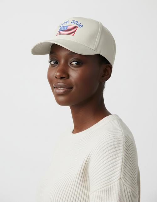 Person wearing a beige cap with an American flag design on a white background