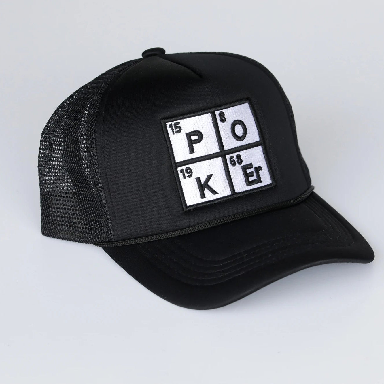 Black trucker cap with a poker-themed design on a white background